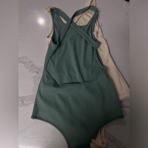 Bundle three backless bodysuits